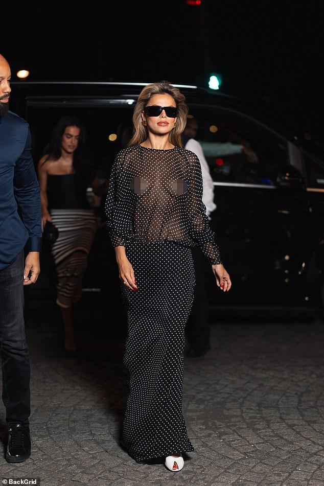 Brooks Nader goes braless AGAIN in another racy sheer top as she arrives at her hotel in Paris