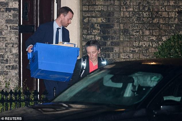 Police remove boxes of material from Peter Mandelson's homes in London and Wiltshire amid Epstein leak probe - as PM says 'significant volume' of material to be looked at over US role
