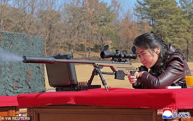 Perfect present for a teenager! Kim Jong Un gives daughter, 13, a SNIPER RIFLE for latest photo op as belief grows he is grooming her as next leader of North Korea