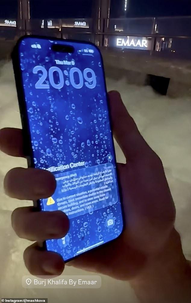 Sirens and missile alerts ring out across Dubai with tourists taking selfies in bomb shelters - and roof-top hot tubs - after Iran launches drone barrage on UAE