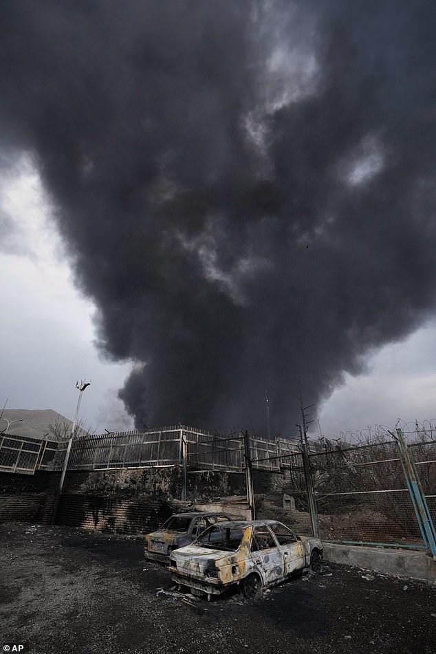 Iran announces it has chosen a new supreme leader as Tehran chokes in fire and smoke