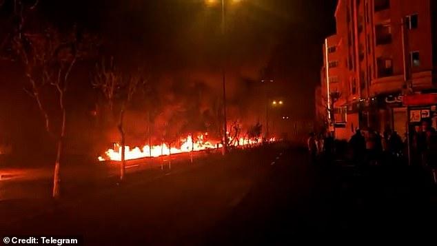 Moment gas pipes explode causing fire to rip through Tehran streets after Israeli strikes hit oil depots