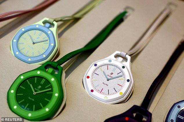 Chairs thrown in Manchester. Police dogs in Battersea. And tear gas fired in Paris...Just why Swatch shops globally have been besieged by young men in search of the garish £335 Pop watch writes ROBERT HARDMAN