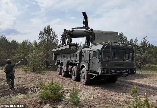 Putin's nuclear build-up on NATO's doorstep: Russia transports nukes to Belarus as allies rehearse strikes on the West