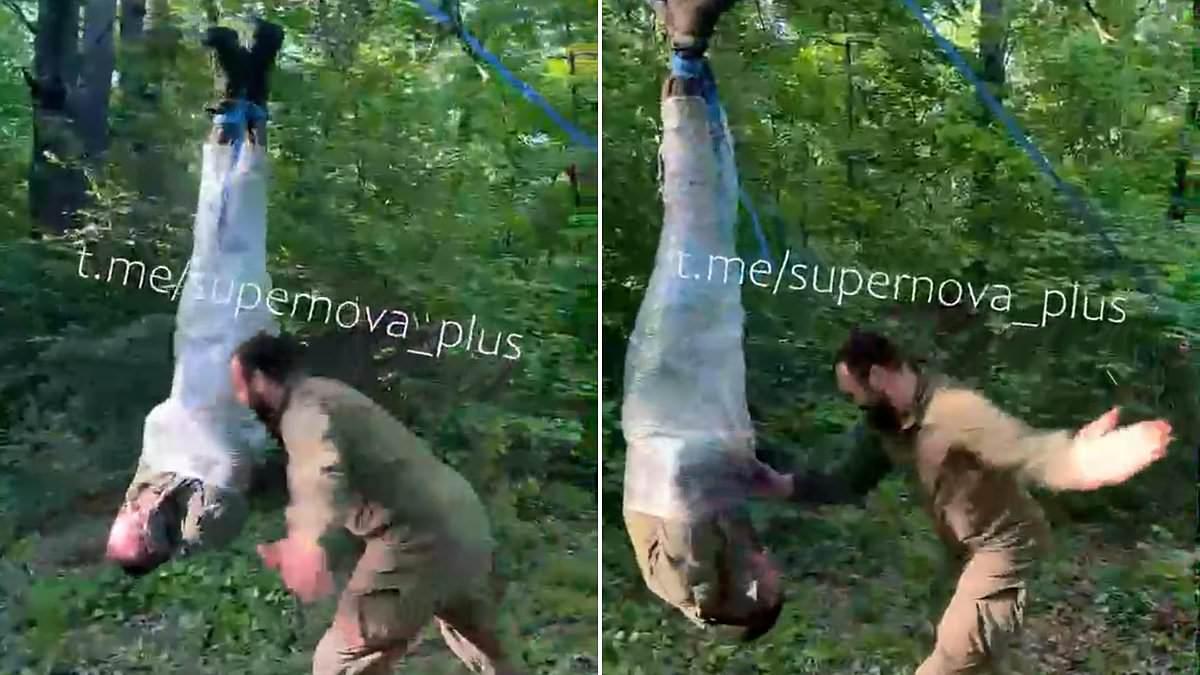 Putin soldier is wrapped in clingfilm, hung upside down and beaten by commander in latest example of brutal punishment
