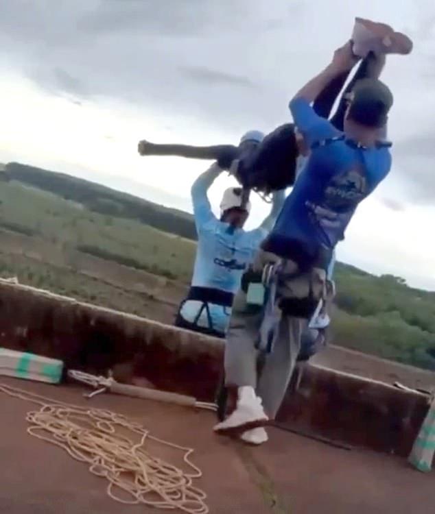 Bungee jump instructors 'removed GoPro camera from body of woman after hurling her off a bridge without a rope attached', witness claims