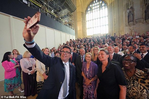 Gissa job Andy! Labour MPs - including Rayner and Streeting - clamour for a selfie with would-be PM Burnham as they bid for a role in his new regime... but Reeves faces chop