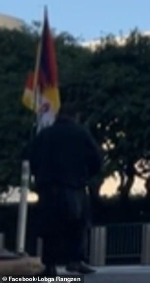 Terrifying moment Tibetan protester sets himself on FIRE outside United Nations building in NYC
