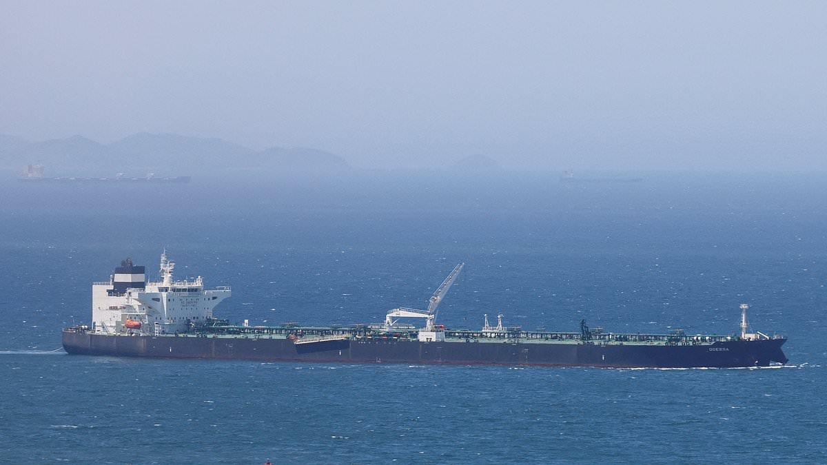 Natural gas tanker set ablaze in Strait of Hormuz as Iran launches latest strike while country mourns Ayatollah