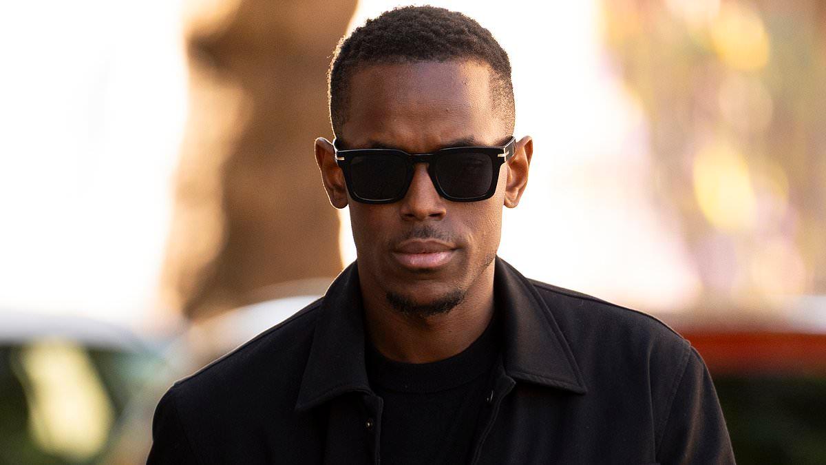 Top Boy star Micheal Ward sobs in the dock as he is cleared of raping a woman in the back of a car