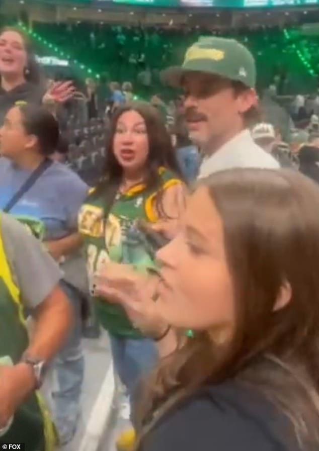 Seattle Storm fans caught lashing out at Sophie Cunningham allies... as another appears to spit on a Fever supporter amid trans debate
