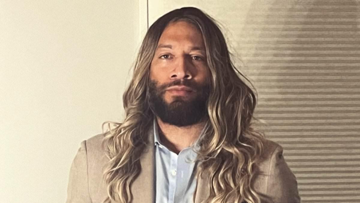 Ex-NBA player who says he is now a woman and has declared for the WNBA Draft poses in a wig: 'My feminine era'
