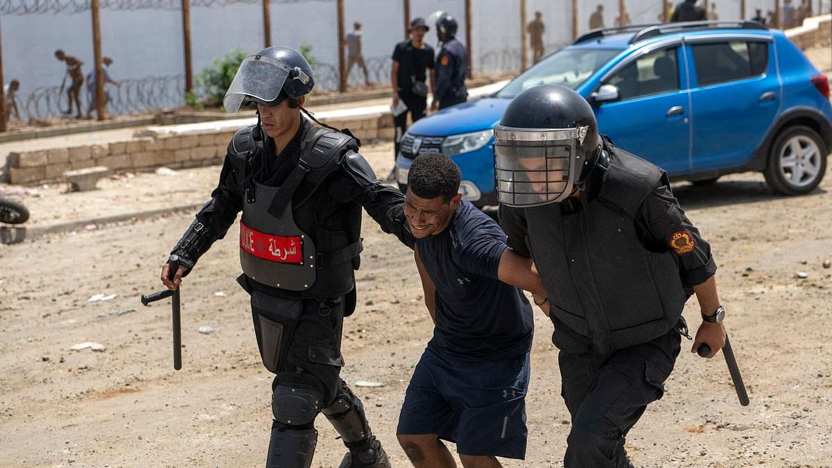 Morocco deploys hundreds of troops to the border over fears another huge migrant 'invasion' of Ceuta is imminent