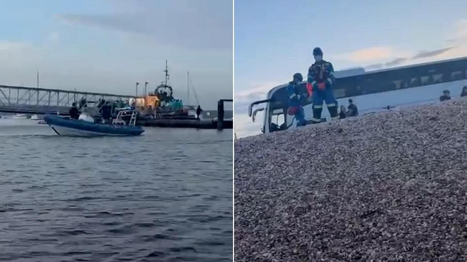 Moment dozens of anti-migrant protesters wade into sea to meet boat packed with 140 asylum seekers as it docks in Portsmouth - sparking clashes with riot police
