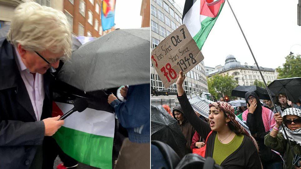 ROBERT HARDMAN: Hiding behind umbrellas, the ghouls marching for Hamas on the October 7th anniversary...