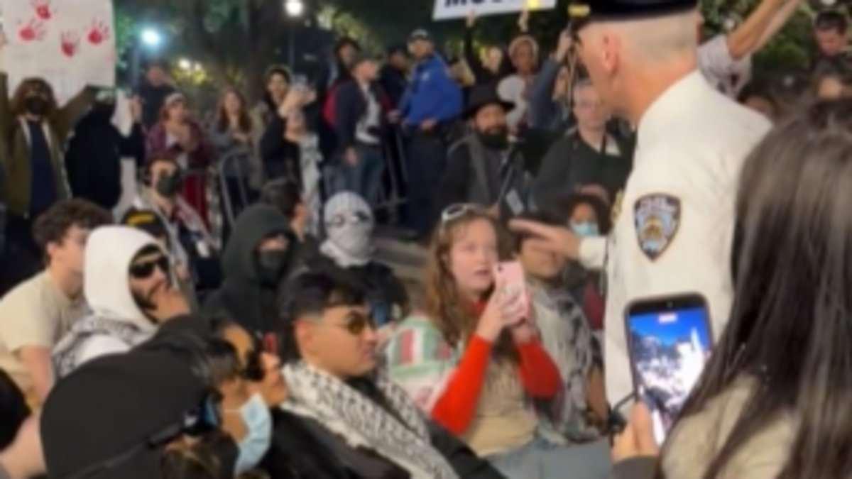 Woke NYC teacher with fondness for rainbow knitwear among posse who disrupted vigil to remember 1,200 murdered on October 7
