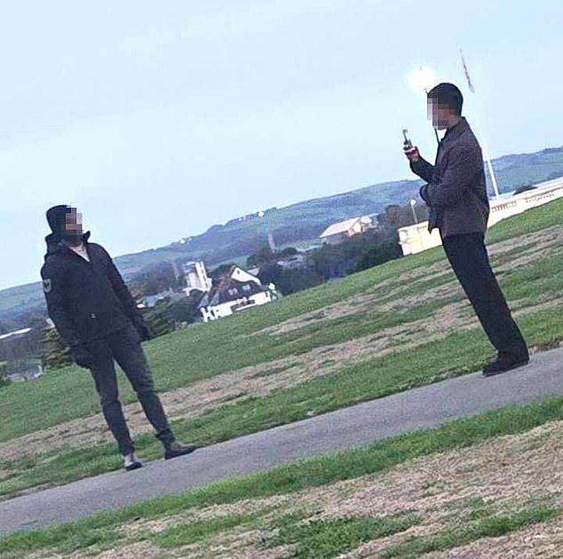 Indian Navy sailors visiting UK on training exercise are mistaken for migrants by anti-immigration protesters in Plymouth