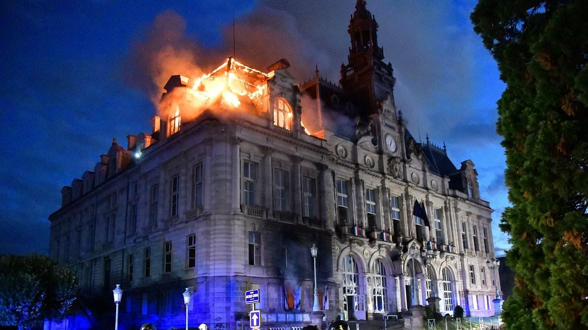 Far-left activist known to police is arrested over arson attack that destroyed historic town hall during French riots