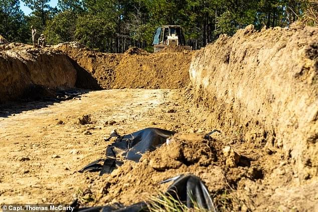 US Army prepares for mass casualties with drill digging graves amid a looming war threat