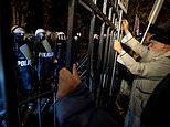 Riot police deployed to Poland's top court amid claims of 'coup' over suspension of chief judge in battle between Donald Tusk's centrist government and nationalist right