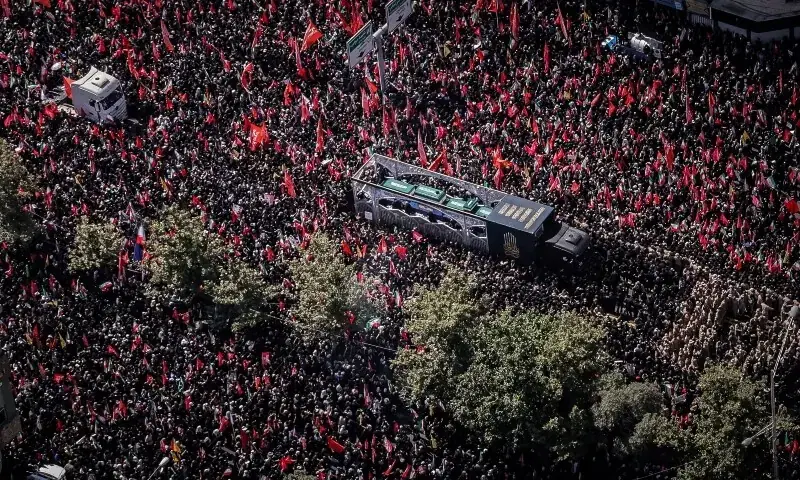 Millions gather as funeral procession of Iran's assassinated supreme leader begins in Tehran