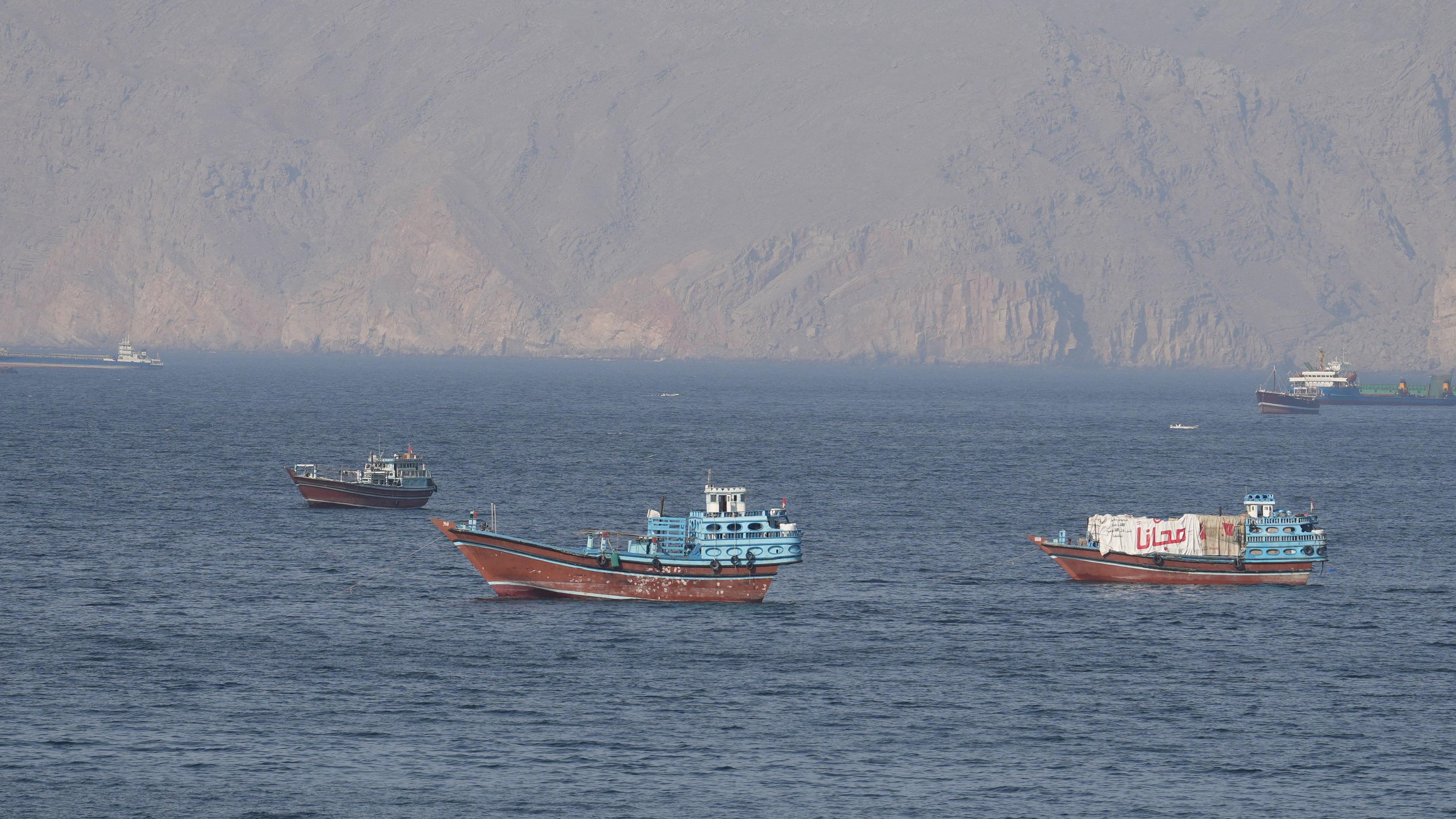 US seizes Iranian ship as strait is closed