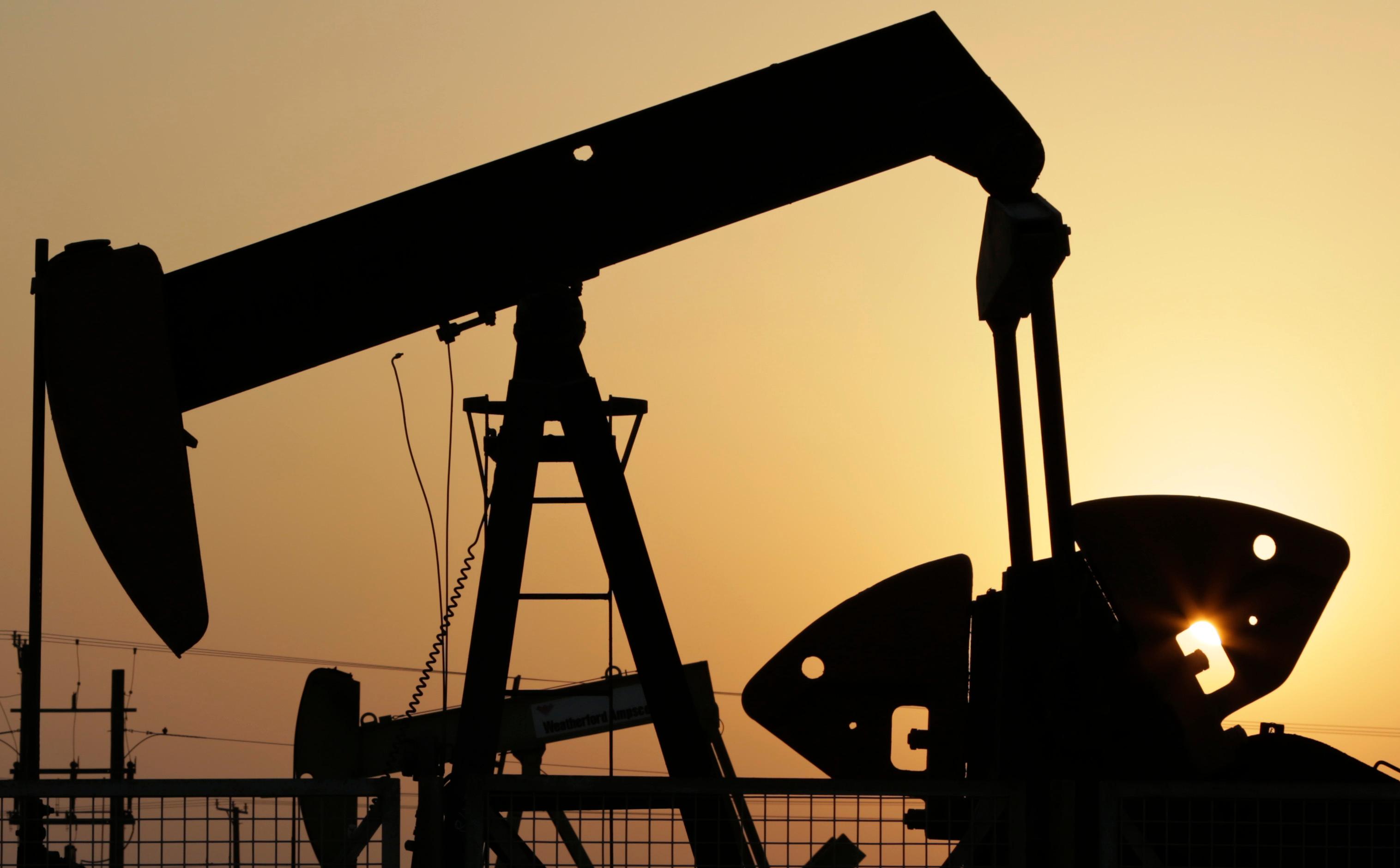 Key oil benchmark tops $100 a barrel for first time since July