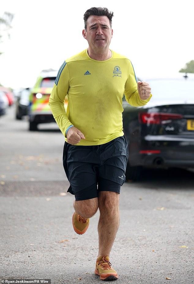 Nowhere to run Andy! New PM Burnham goes for a jog as latest migrants cross the Channel two days after 165 made the trip in single boat
