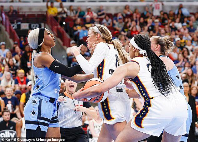 Sophie Cunningham slams WNBA rival for 'playing the race card' after she claimed 'white privilege' caused her to be kicked off the court for brutal foul that left Fever star bloodied