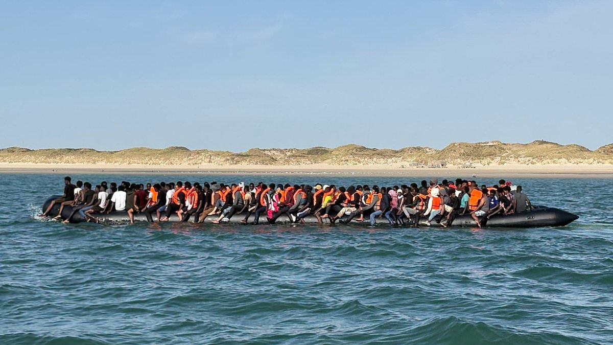 The day small boats crisis became a BIG boats crisis: Forty-nine foot mega-dinghy carrying 230 migrants - more than a Boeing 737 - reaches Britain