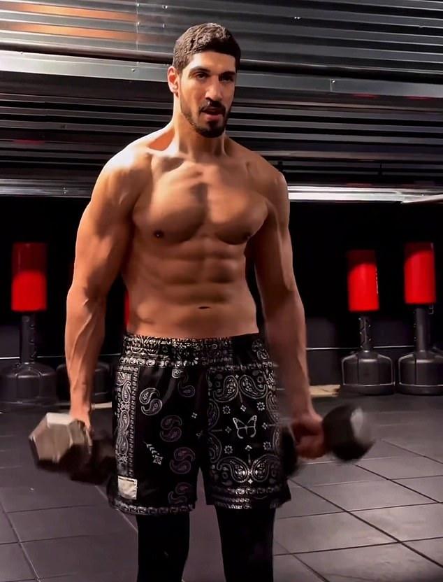 Ex-NBA star begins 'transition to WNBA' with shirtless workout after declaring for draft amid league's trans feud