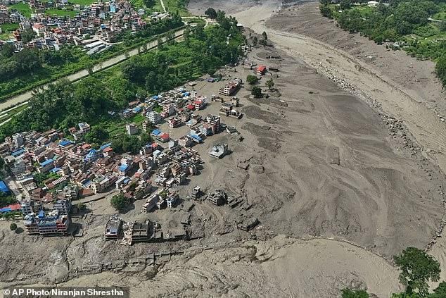 Rescuers battle to reach parts of Nepal obliterated by collapsed glacier flood amid fears thousands are dead: Hundreds of tourists' families face agonising wait for news of relatives caught in torrent as receding waters reveal grisly toll
