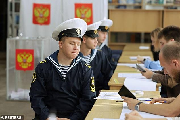 Russians begin voting in staged election Putin is guaranteed to win - with parties that support his war the only ones allowed to enter