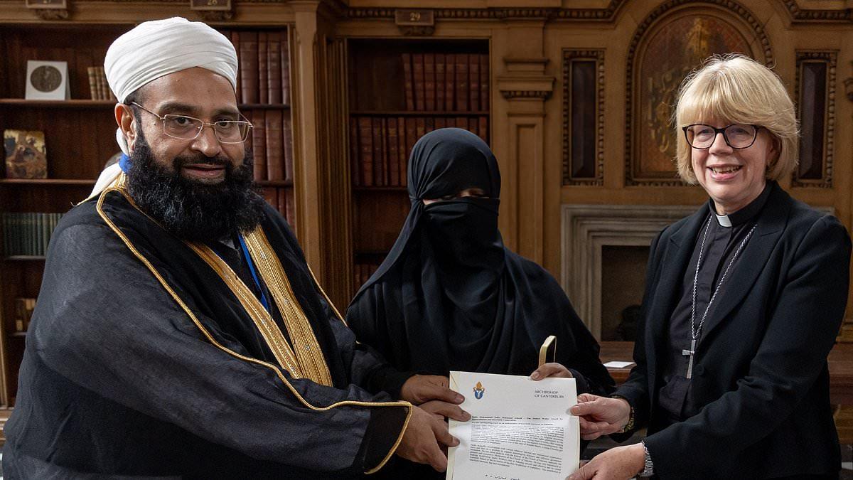 Archbishop of Canterbury is accused of condoning repression of Muslim women after she is pictured with covered wife of Islamic cleric who honoured Osama bin Laden