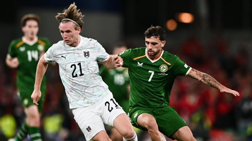 Republic of Ireland and Austria draw in game briefly halted by protests