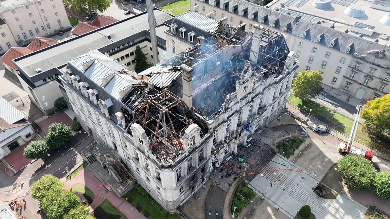 Suspect arrested after historic town hall set alight - French media