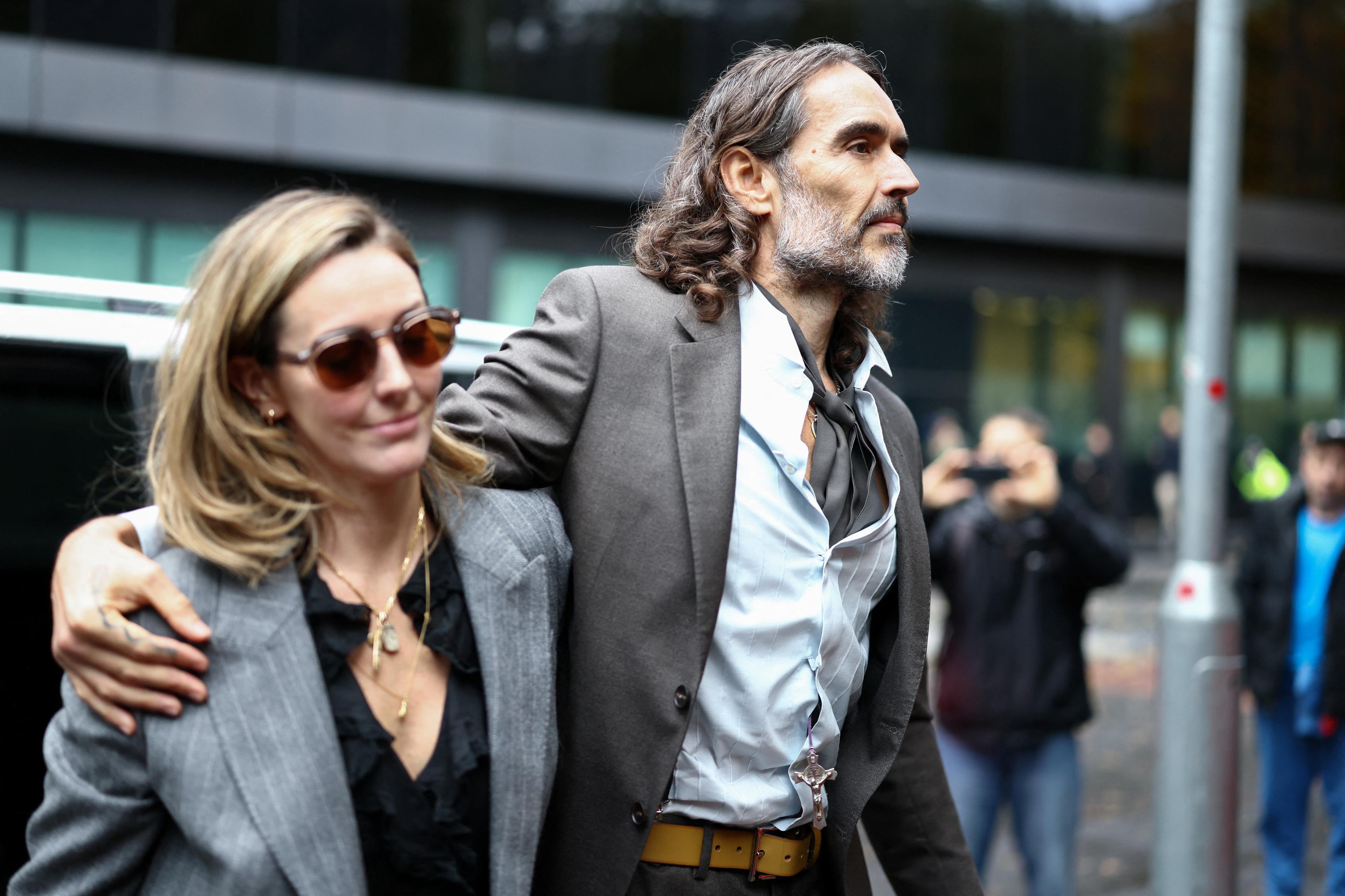 Russell Brand on trial for rape as actor's wife says monogamy was 'difficult' for him