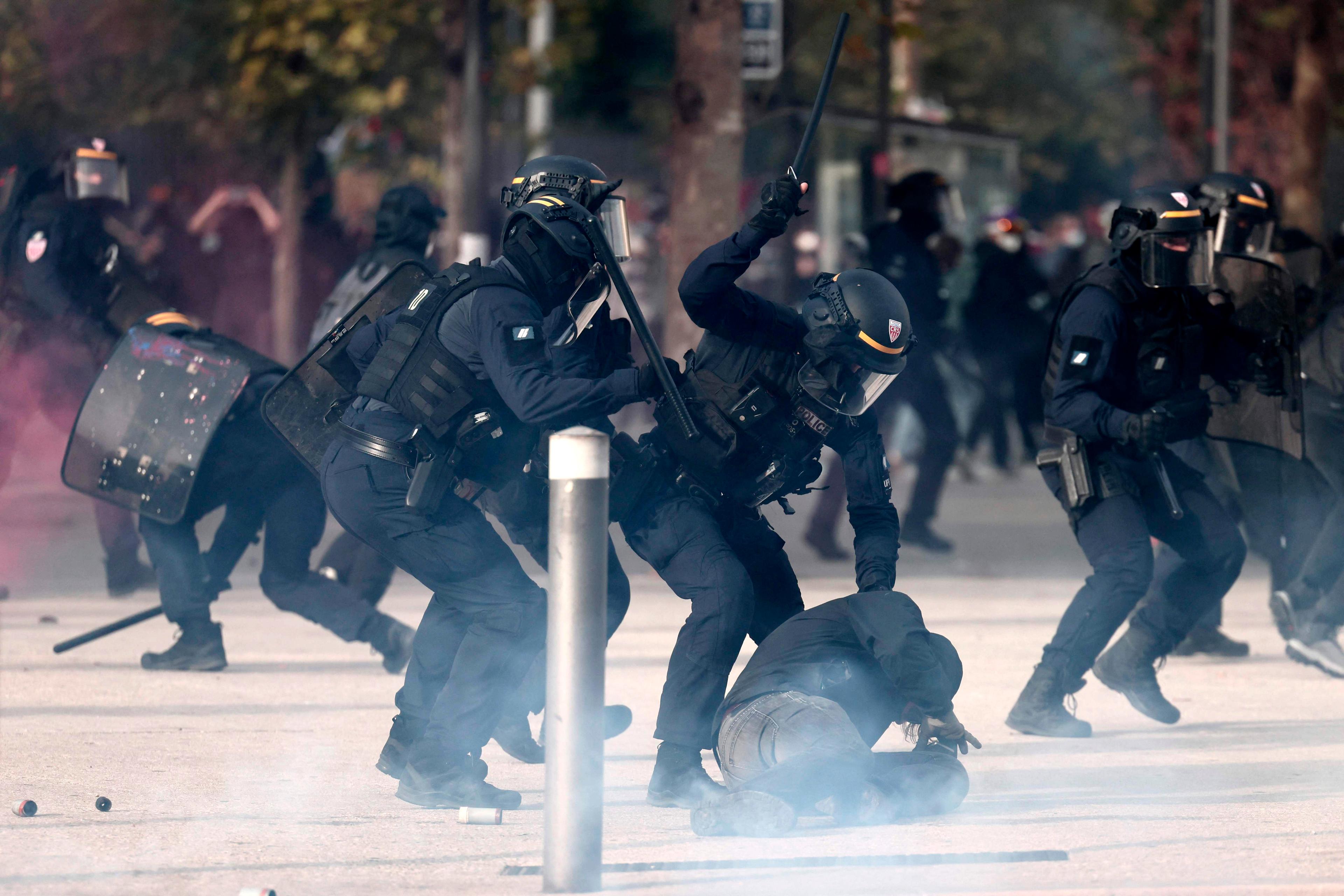 France sees another day of protests under heavy police presence; demonstrations spread across the country, and 135 are arrested