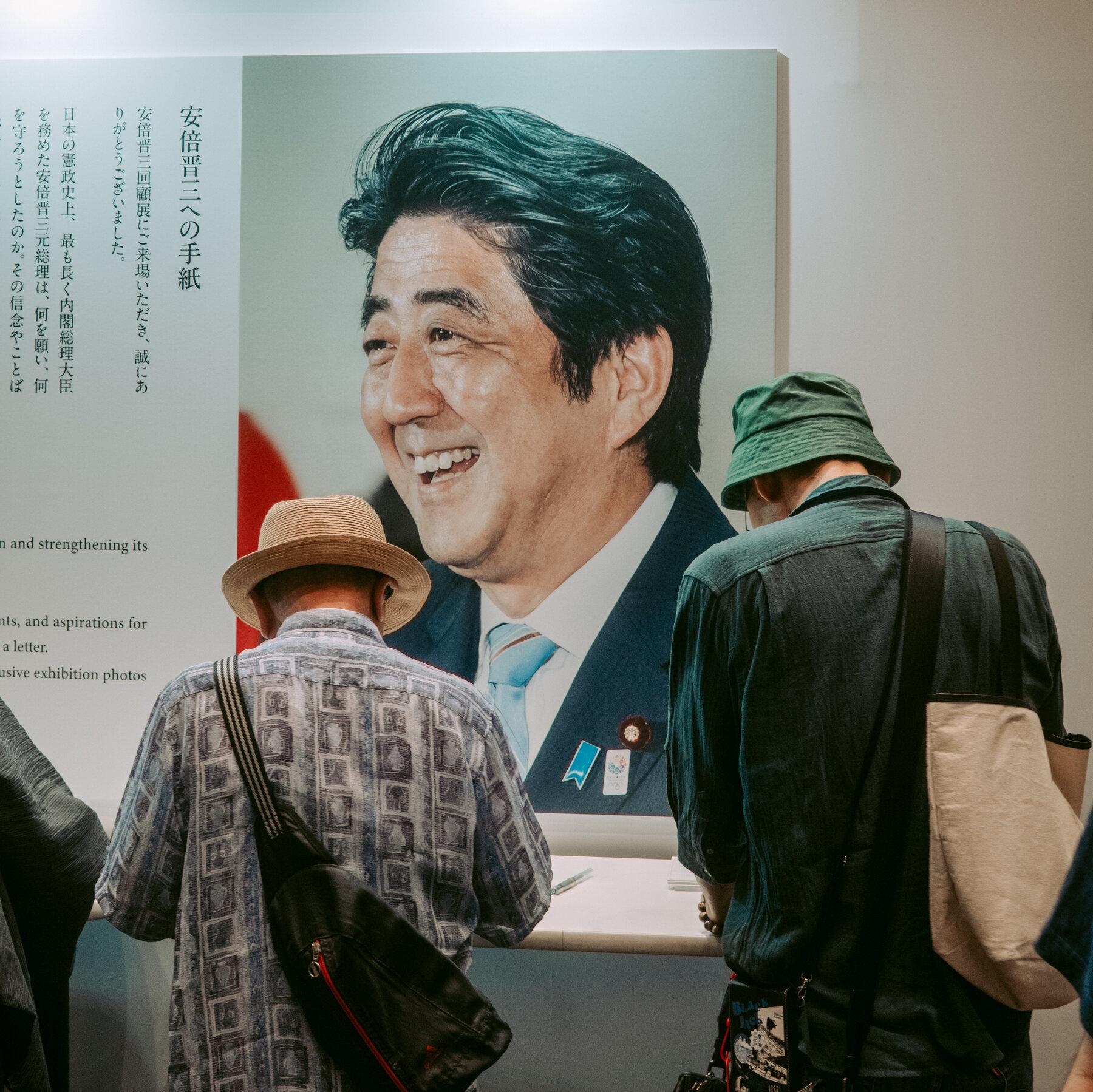 Japan’s Leader Invokes Her Hero, Shinzo Abe, to Drive Nationalist Agenda