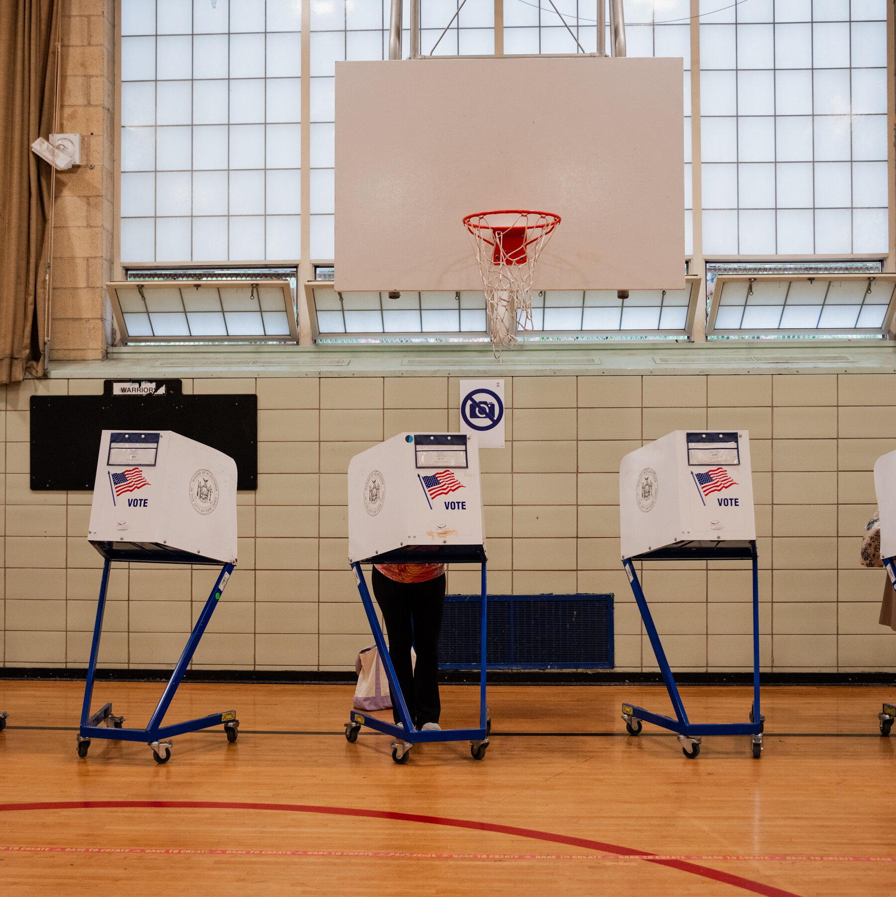 Civil Rights Groups Sue to Keep Armed Agents Away From Voting Sites